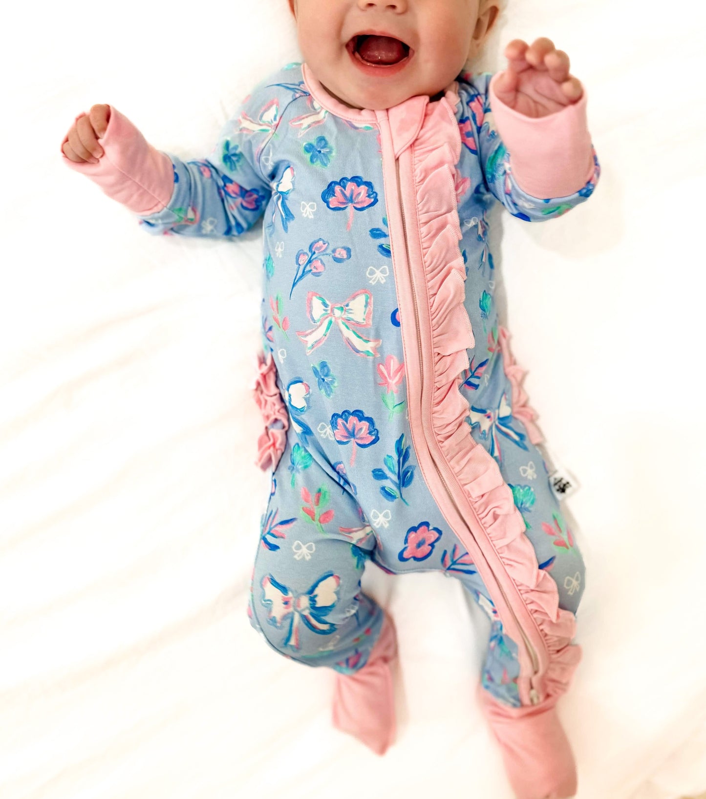 Kinder Dreams: Amora’s Floral Ruffled Zippy (ships in 3-5 business days)